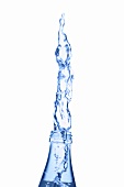 Water gushing out of a bottle