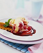 Vanilla & raspberry ice cream with waffles & raspberry sauce