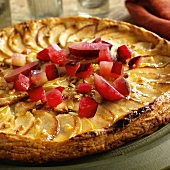 Apple tart with plums