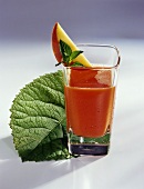 Vitamin drink with mango, papaya and blood oranges