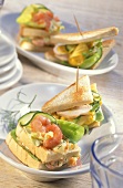 Two sandwiches with shrimp salad and chicken salad