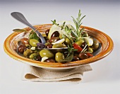 Bottled olives with Mediterranean herbs