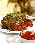 Leg of lamb with tomatoes