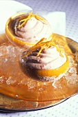Ice-cold orange mousse in hollowed-out oranges