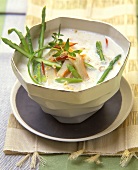 Coconut soup with asparagus and crab