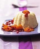 Vanilla semolina flummery with kumquat & pomegranate sauce