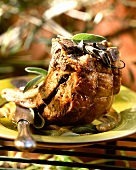 Roast pork with olive and anchovy stuffing and sage