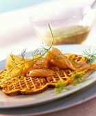 Potato waffle with salmon and mustard and dill sauce