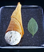 Mascarpone and basil ice cream in wafer cone
