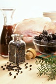 Ingredients for roast duck with plums and juniper berries