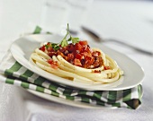 Macaroni with red pepper, anchovies and olives