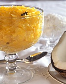 Exotic pineapple and coconut dessert in a glass bowl