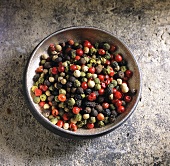 Red, green, black and white peppercorns, mixed