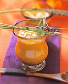 Creamed pumpkin soup with rice and sherry, served in glass