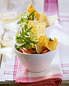 Green salad with roast beef and Parmesan crisps
