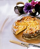 Apple and Calvados cheesecake, a piece cut