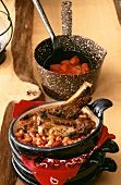 Barbecued spare-ribs with beans and tomato sauce