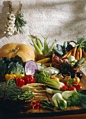 Still life with various vegetables on wooden table