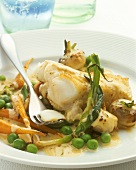 Fried cod with spring vegetables