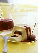 Yoghurt mousse with cherry & chocolate filling & cherry sauce