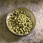 Green peppercorns in an iron bowl