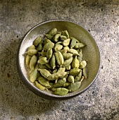 Cardamom in an iron bowl