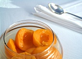 Bottled peaches in jar