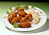 Chicken wings with rice and peppers