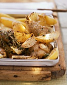 Oven-baked garlic chicken on baking tray