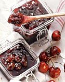 Cherry jam in preserving jars