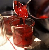 Bottling home-made plum jam