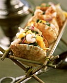 Flatbreads filled with shrimps, mango and herbs