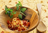 Spicy tomato salad with chili peppers and mint