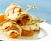 Barbecued turkey rolls with ham and apricot stuffing