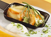 Raclette with vegetables and chives