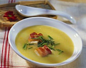 Potato and leek soup with bacon and chives