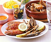Spanish fish platter, stew, olives and saffron rice