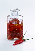 Chili peppers in olive oil