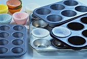 Various muffin tins and paper cases