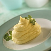Mashed potato with parsley leaves