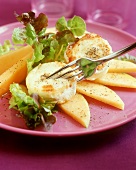 Fried goat's cheese on melon