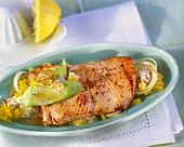 Salmon steak on bed of leeks