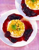 Pineapple flan with blackberry sauce