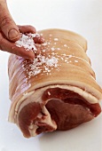 Salting joint of pork