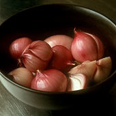 Peeled red onions