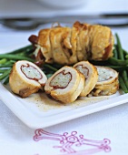 Chicken breast roulade with rice and ham filling
