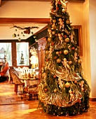 Christmas tree lavishly decorated with angels in traditional restaurant