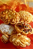 Assorted nut cakes with baking tin