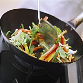 Stir-frying Asian vegetables (in wok)