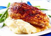 Roast chicken breast on mashed potato